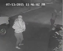 Female Vandals Look and Point Right At Security Camera