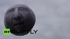 Germany: NGO slams G7's 'hot air' with these super-size balloons!