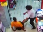 Father sits on son's head after falling backwards