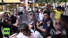 Greece: Angry cleaners show riot police who's boss