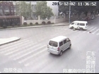 Woman Survives Being Run over by Mini-Van in S China