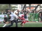 Boris Johnson knocks over Japanese child playing rugby