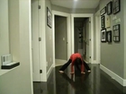 Girl Tries to Do Handstand and Breaks Picture Frame