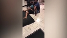 Loss prevention officer caught on camera pinning down a 