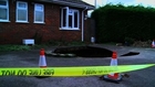 Car swallowed by sinkhole in England
