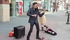 Street performer with a violin and an echo pedal