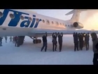 Passengers pushing aircraft - Really Weird !!