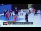 Video: Basketball coach throws girl by her hair